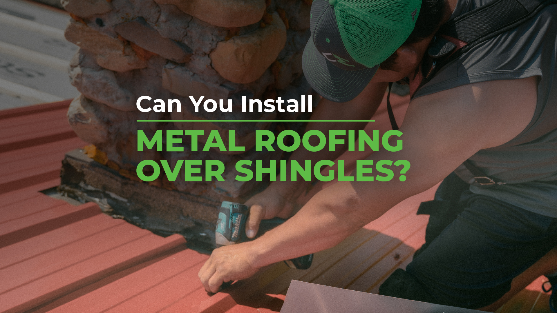 Worker installing metal roofing over shingles with a tool, highlighting the question 'Can You Install Metal Roofing Over Shingles?' in bold green text.